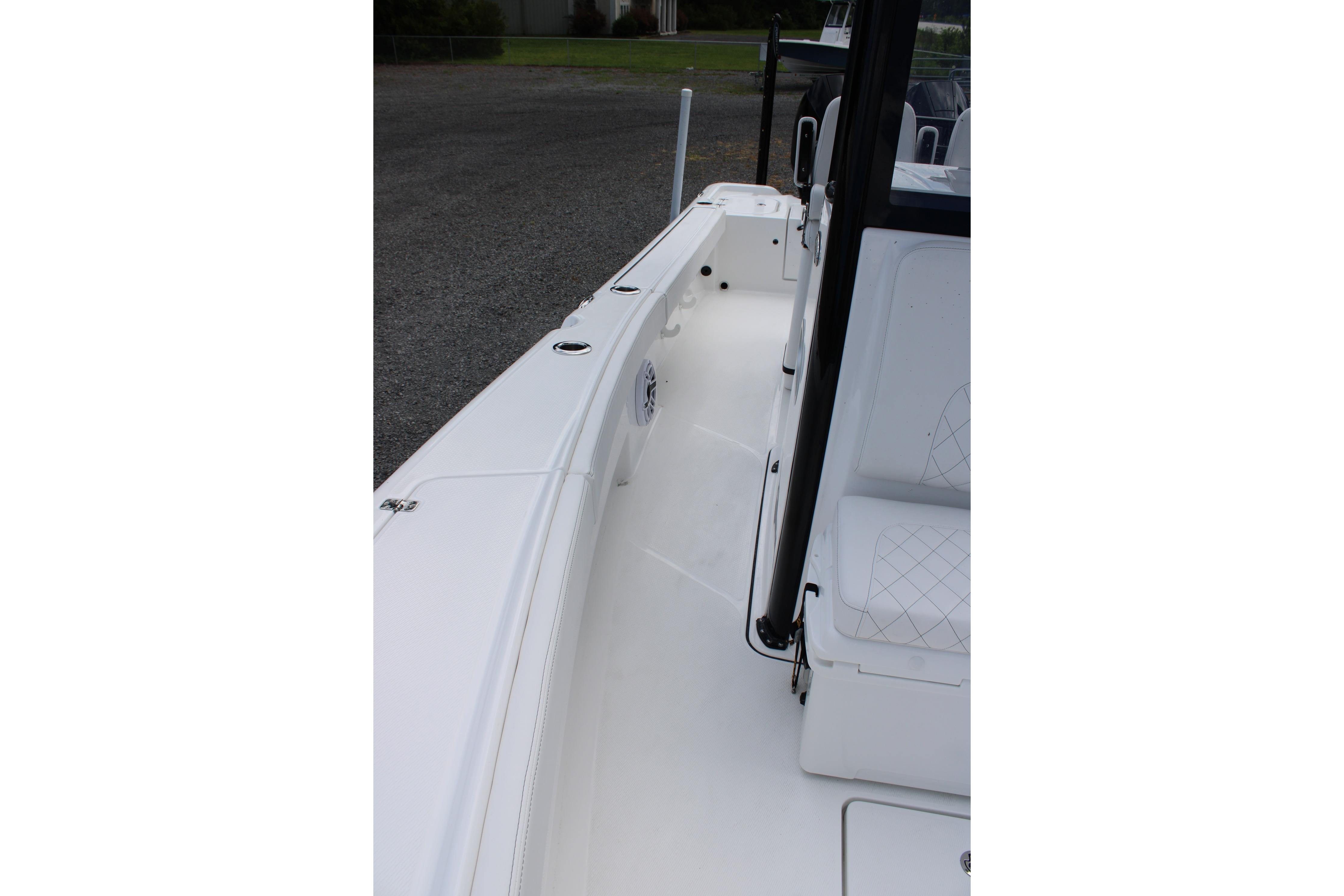 2027 Blazer Bay Makaira 2800 boat interior, featuring sleek white seating and deck design.