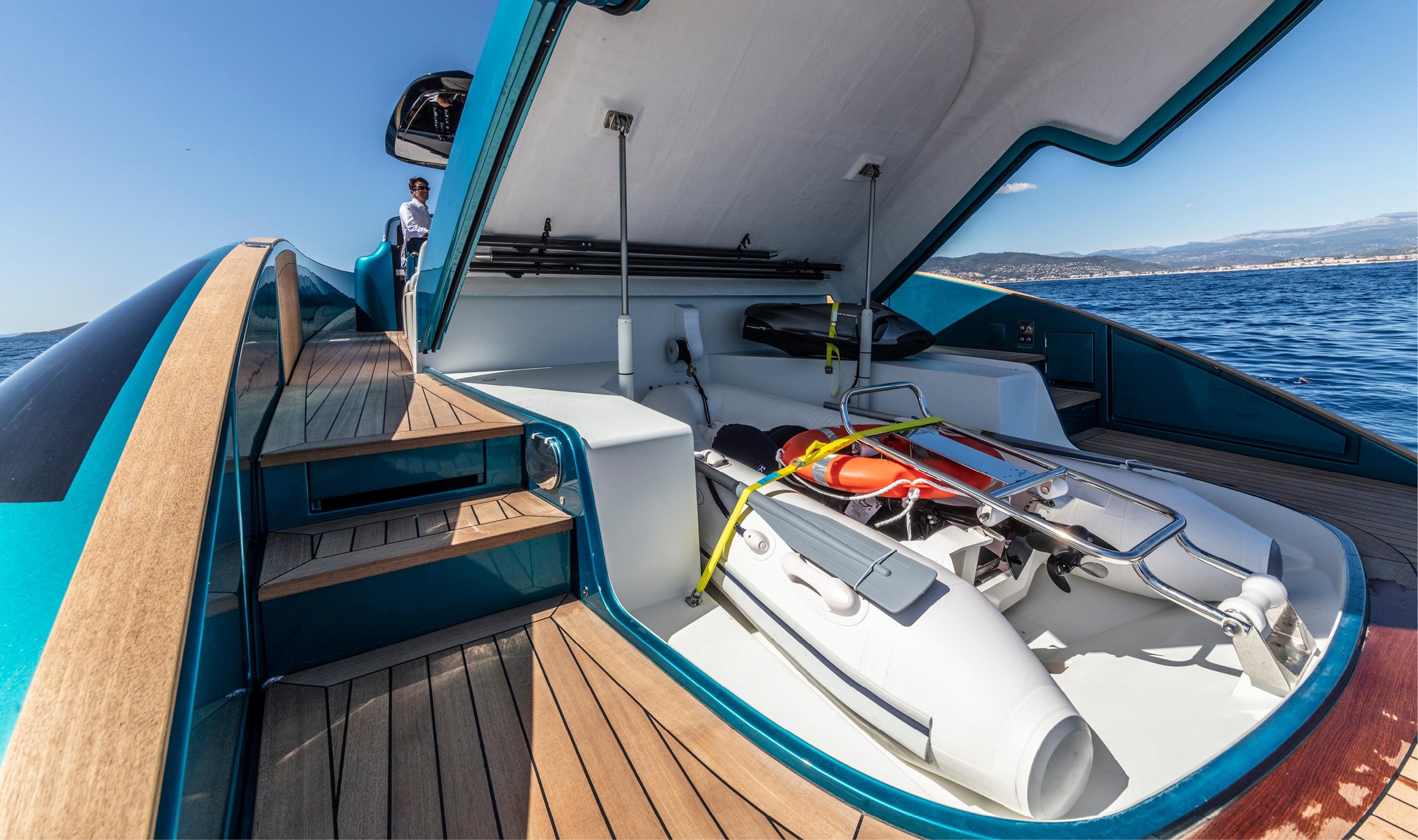 2024 Solaris Power 48 OPEN yacht with open storage compartment and tender.
