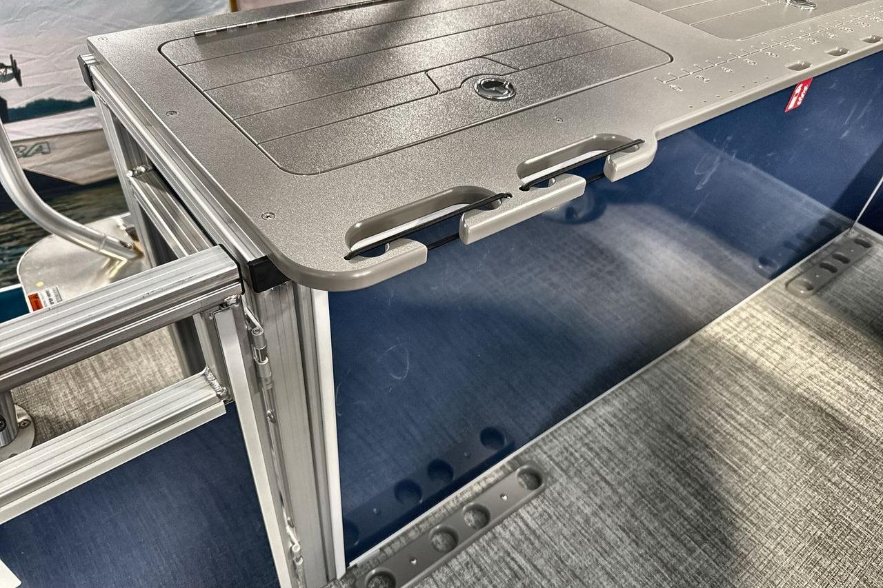 2026 Landau Island Breeze 23F boat detail, featuring sleek aluminum and textured surfaces.