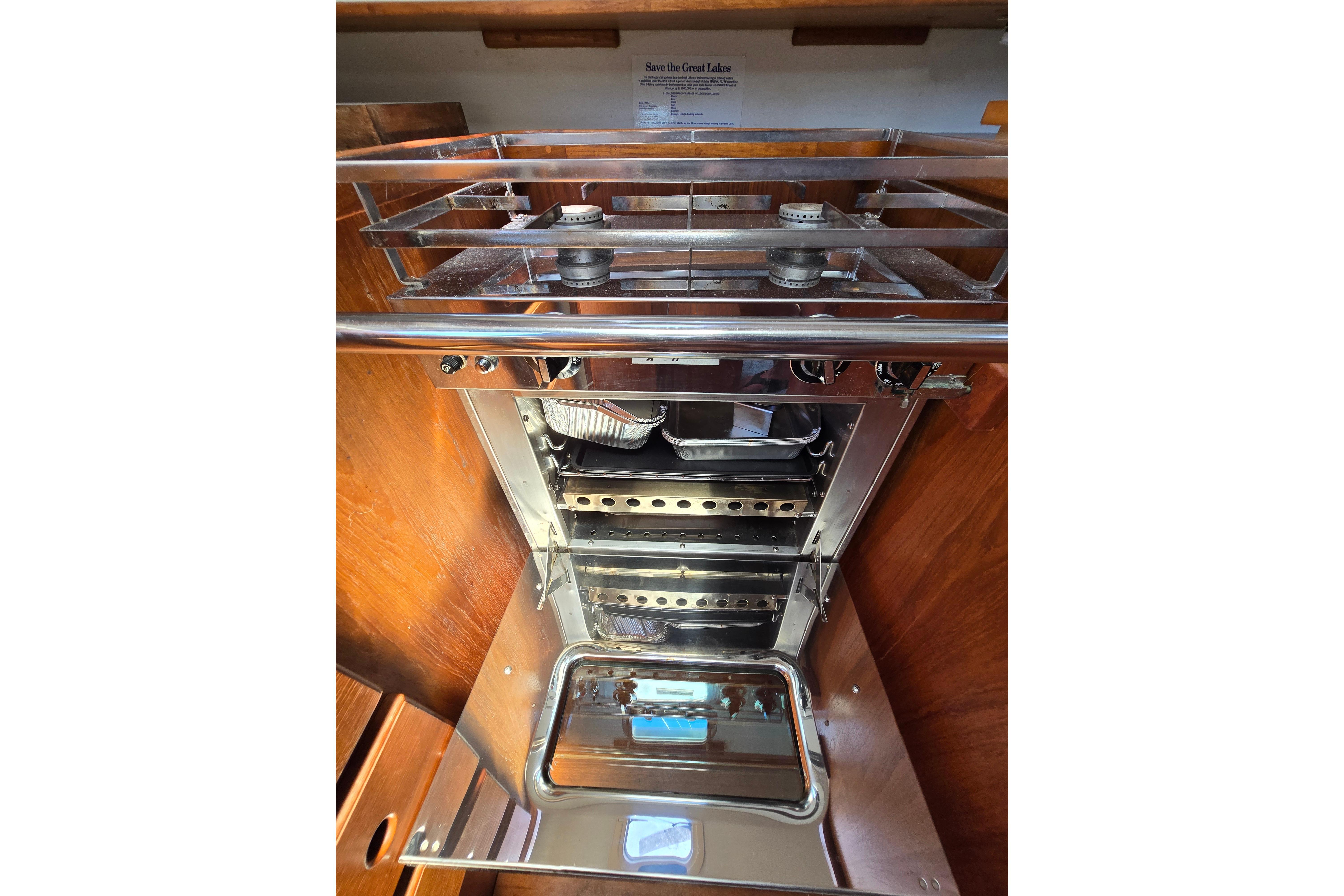 Stainless steel stove and oven in 1993 Caliber 35 yacht kitchen.