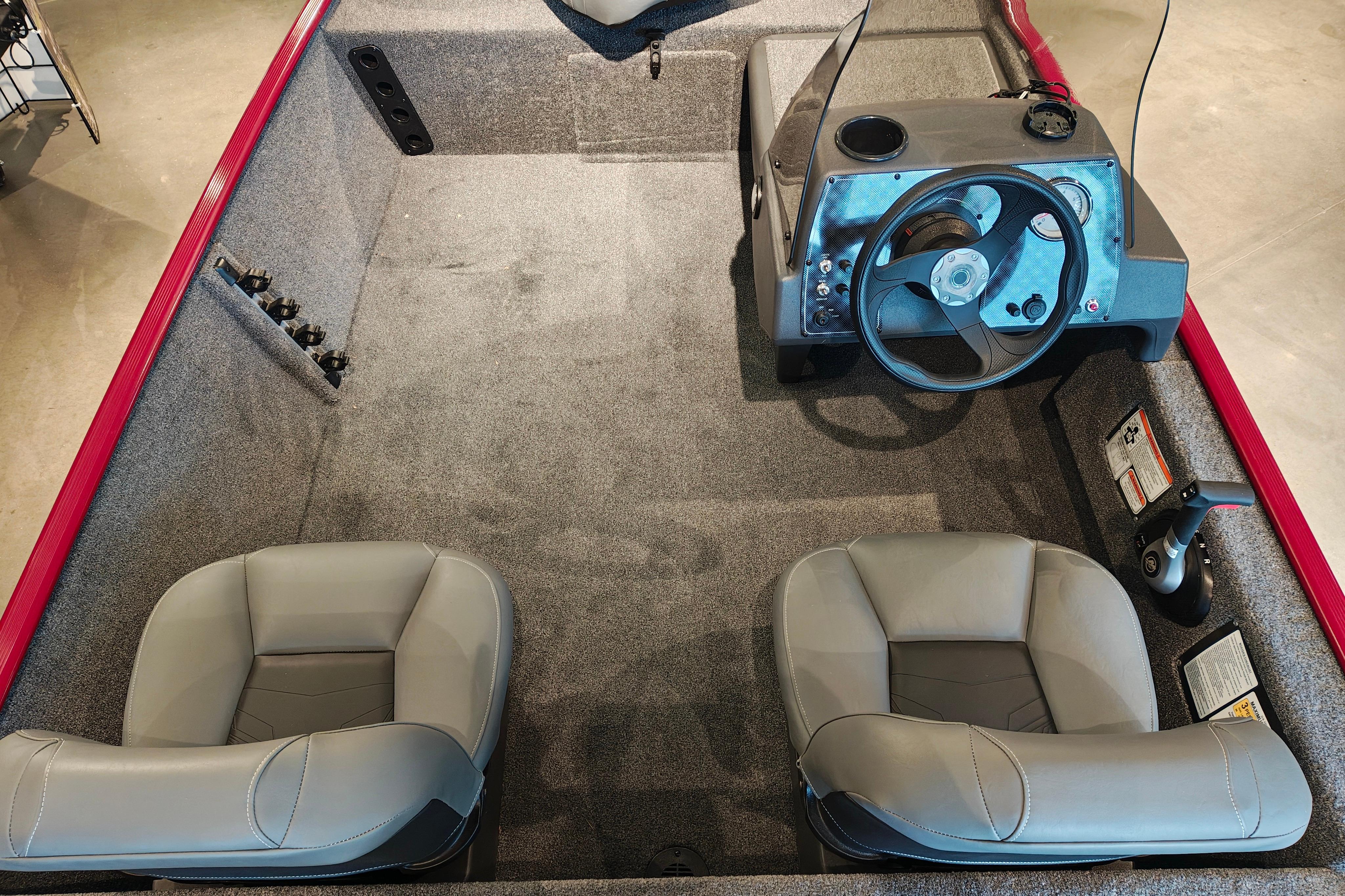 2026 Tracker Bass Tracker Classic XL boat interior with steering wheel and two seats.