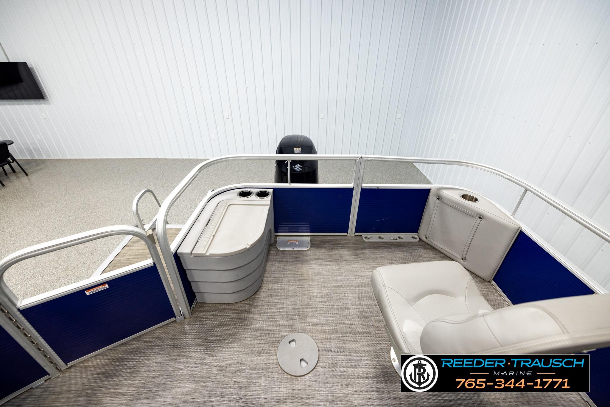 2021 Bennington 20 SV pontoon boat interior with seating and storage compartments.