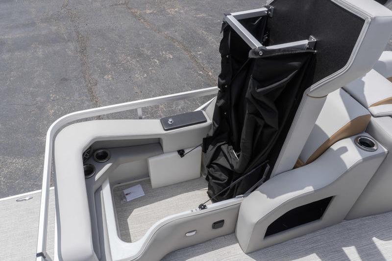 2026 SunCatcher Elite 326 SS boat interior with seating and storage features.