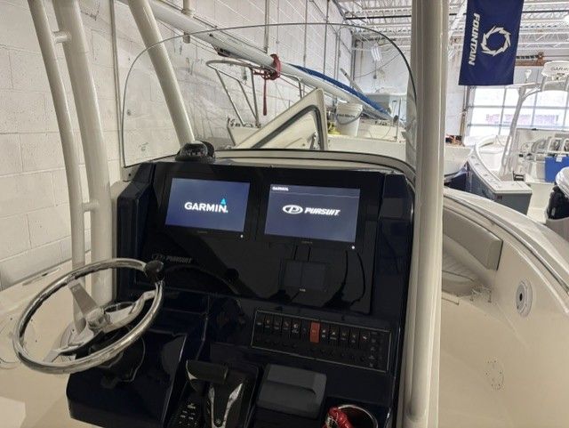 2022 Pursuit C 238 Center Console with Garmin display in interior.