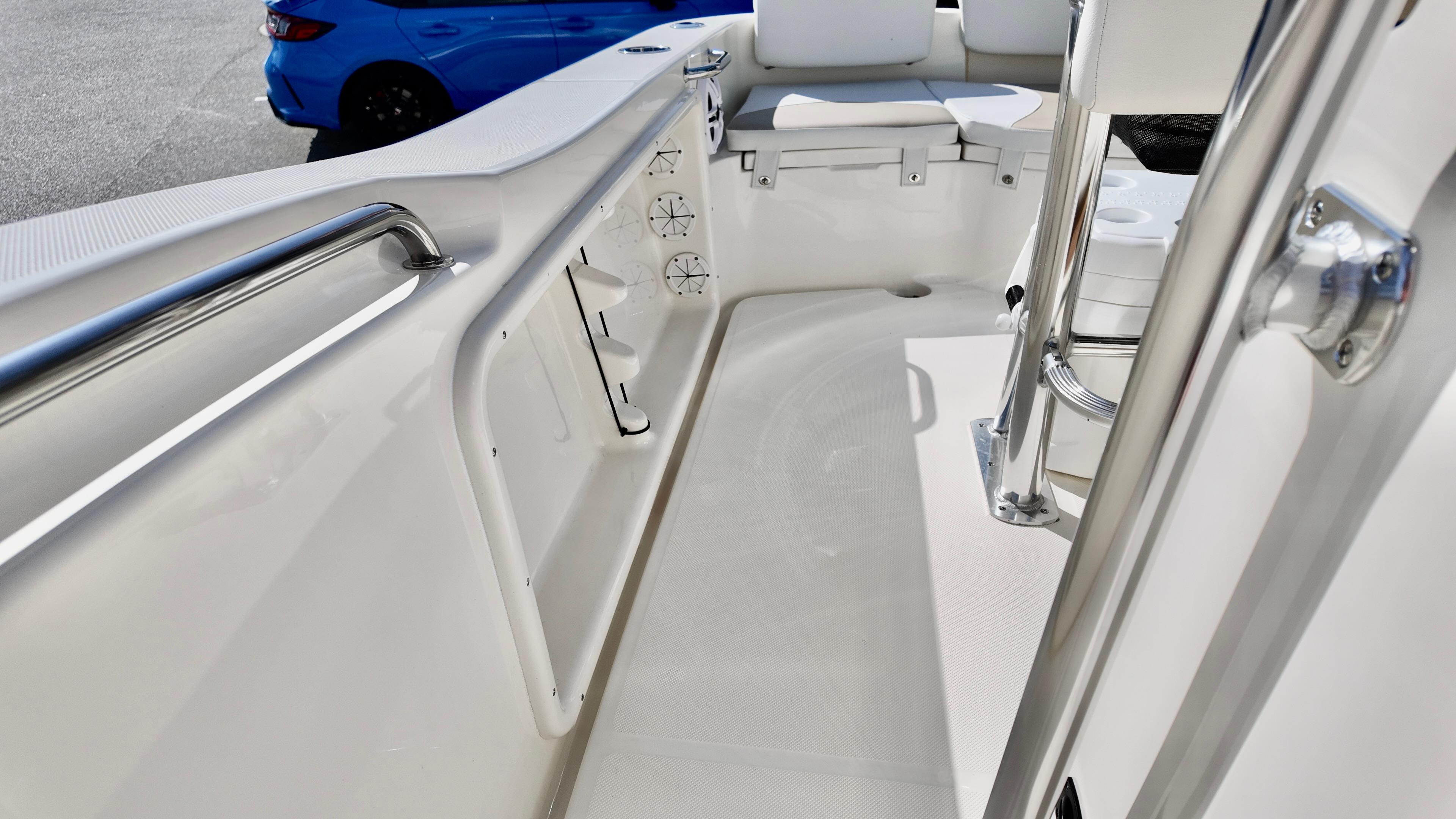 2025 Bulls Bay 200CC boat interior with seating and railing, showcasing sleek design.