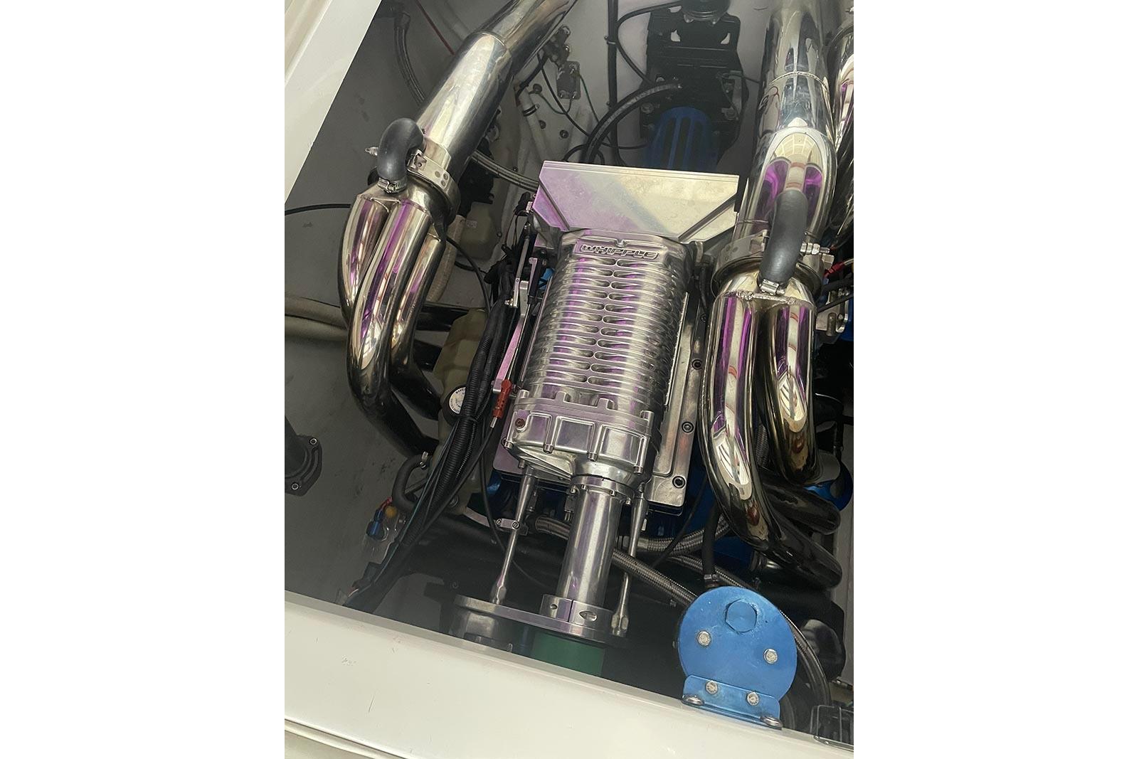 Engine of a 2004 Fountain 38 Lightning boat with polished components.