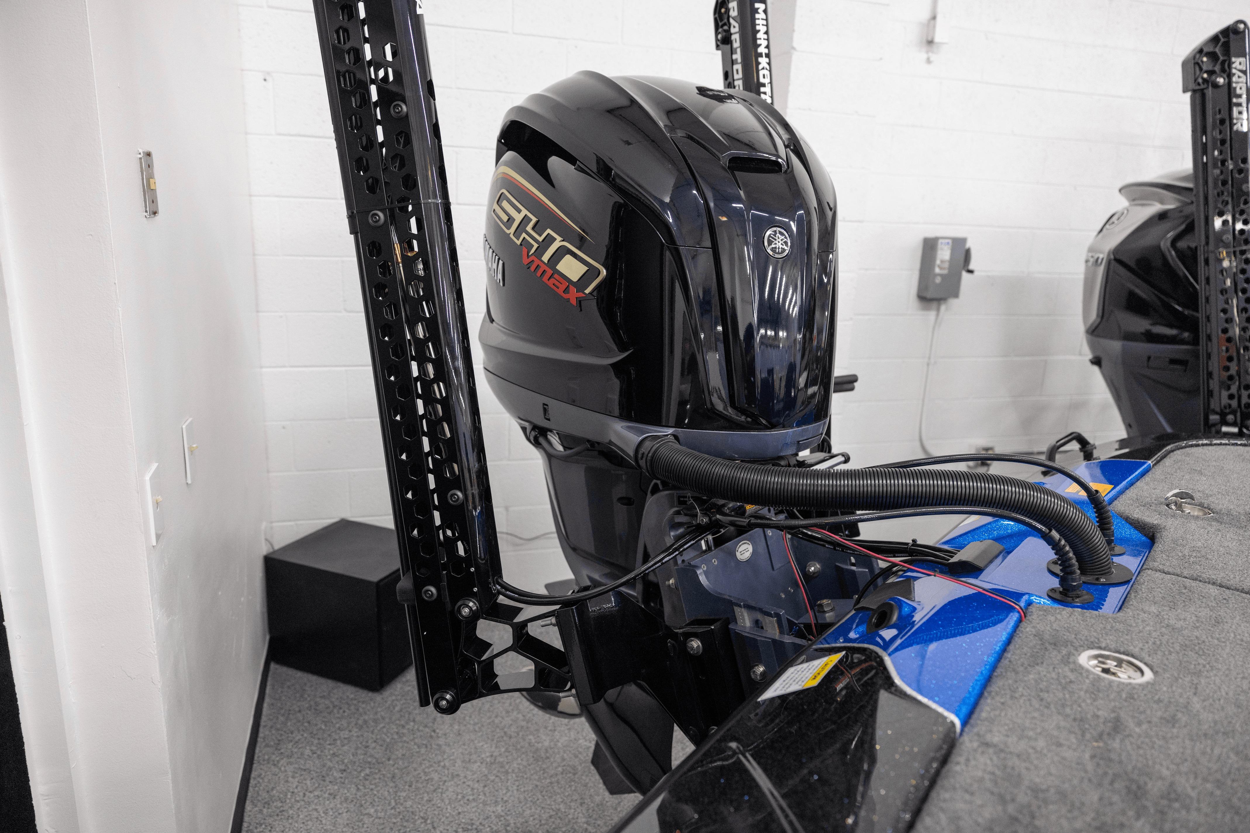 2026 Skeeter ZXE21 boat with Yamaha SHO VMAX engine in showroom.