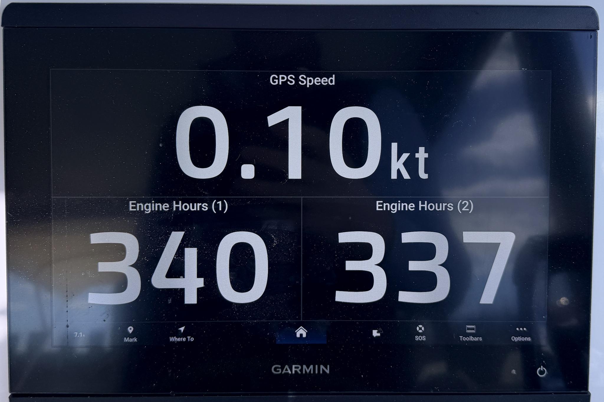 Garmin display showing GPS speed and engine hours for MJM 3, 2022 model.