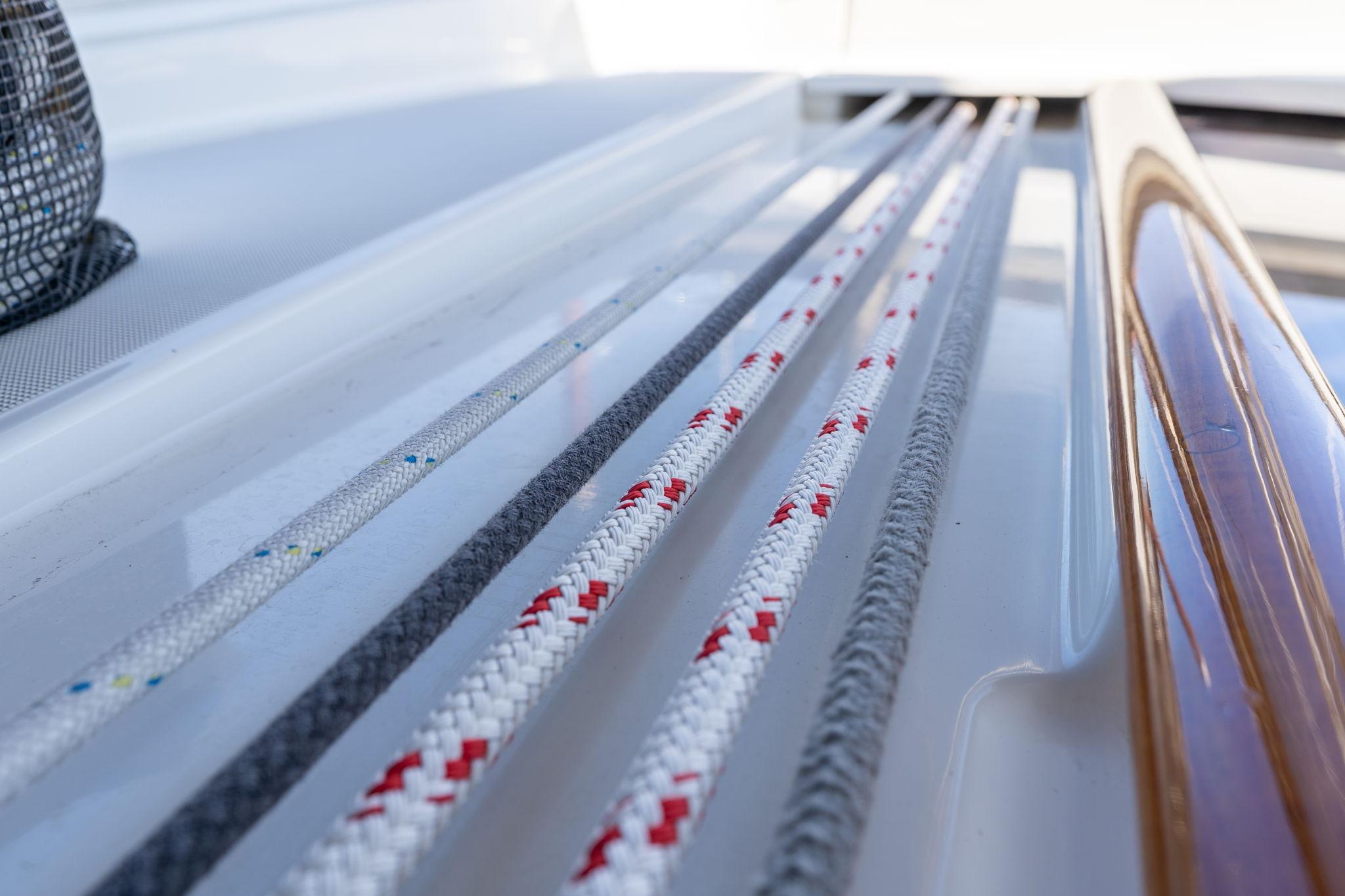 Close-up of ropes on a 2013 Beneteau Oceanis 50 sailboat deck.