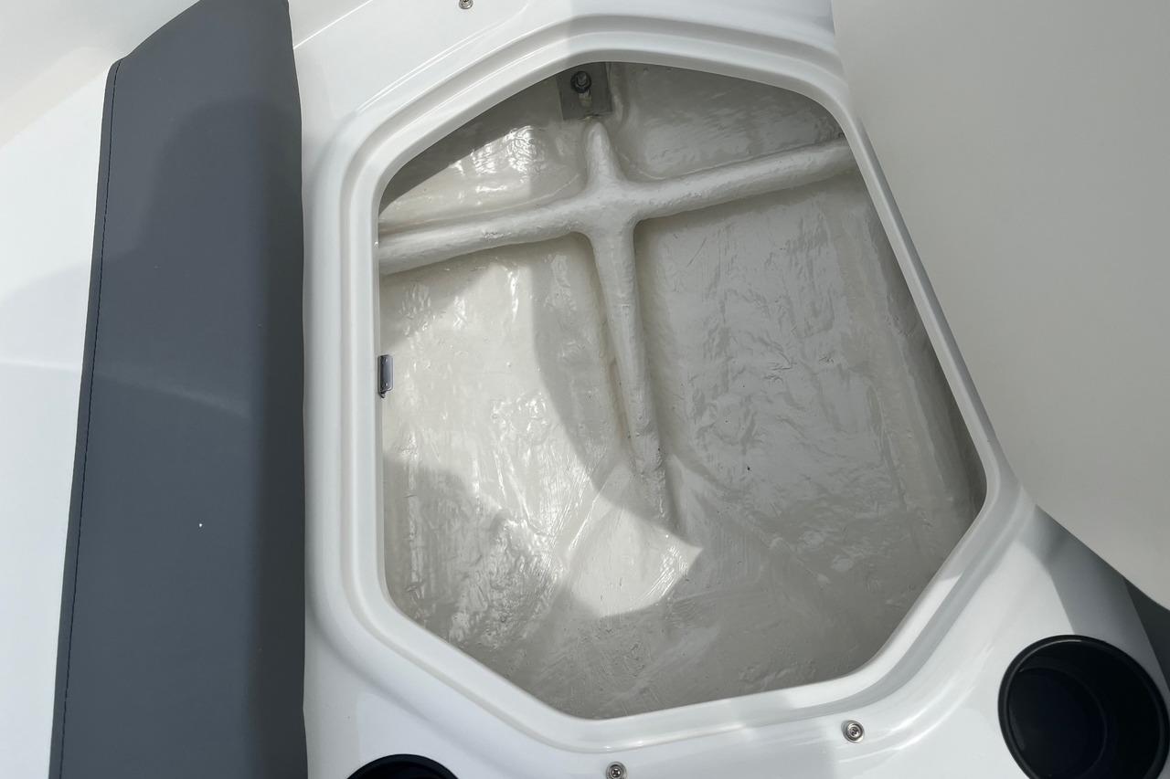Storage compartment in Bayliner Element E16 boat, year 2026.