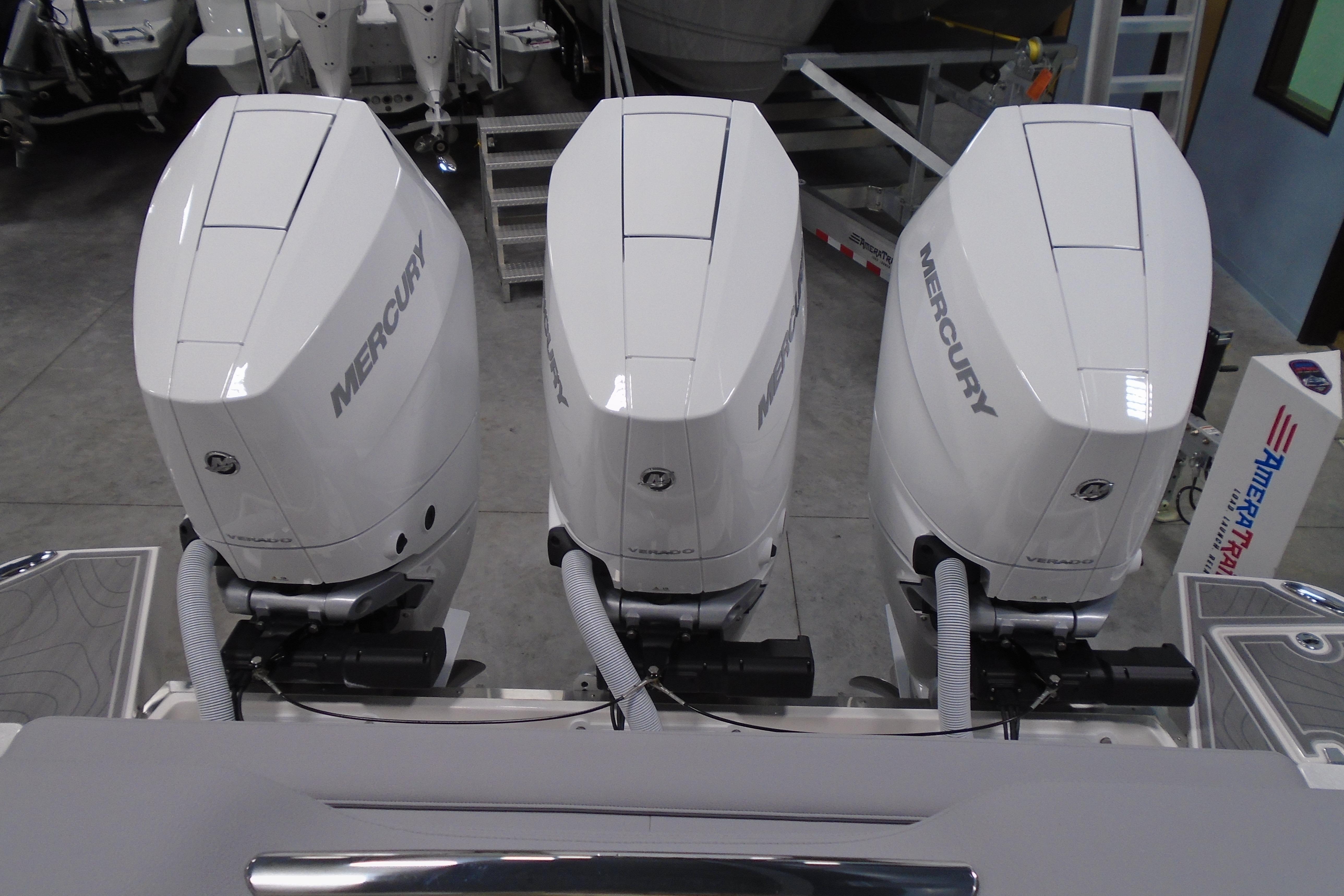 Triple Mercury outboard engines on a 2026 Regal 38 SAV boat.