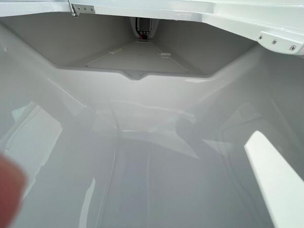 2025 Mag Bay 43 Center Console storage compartment interior.