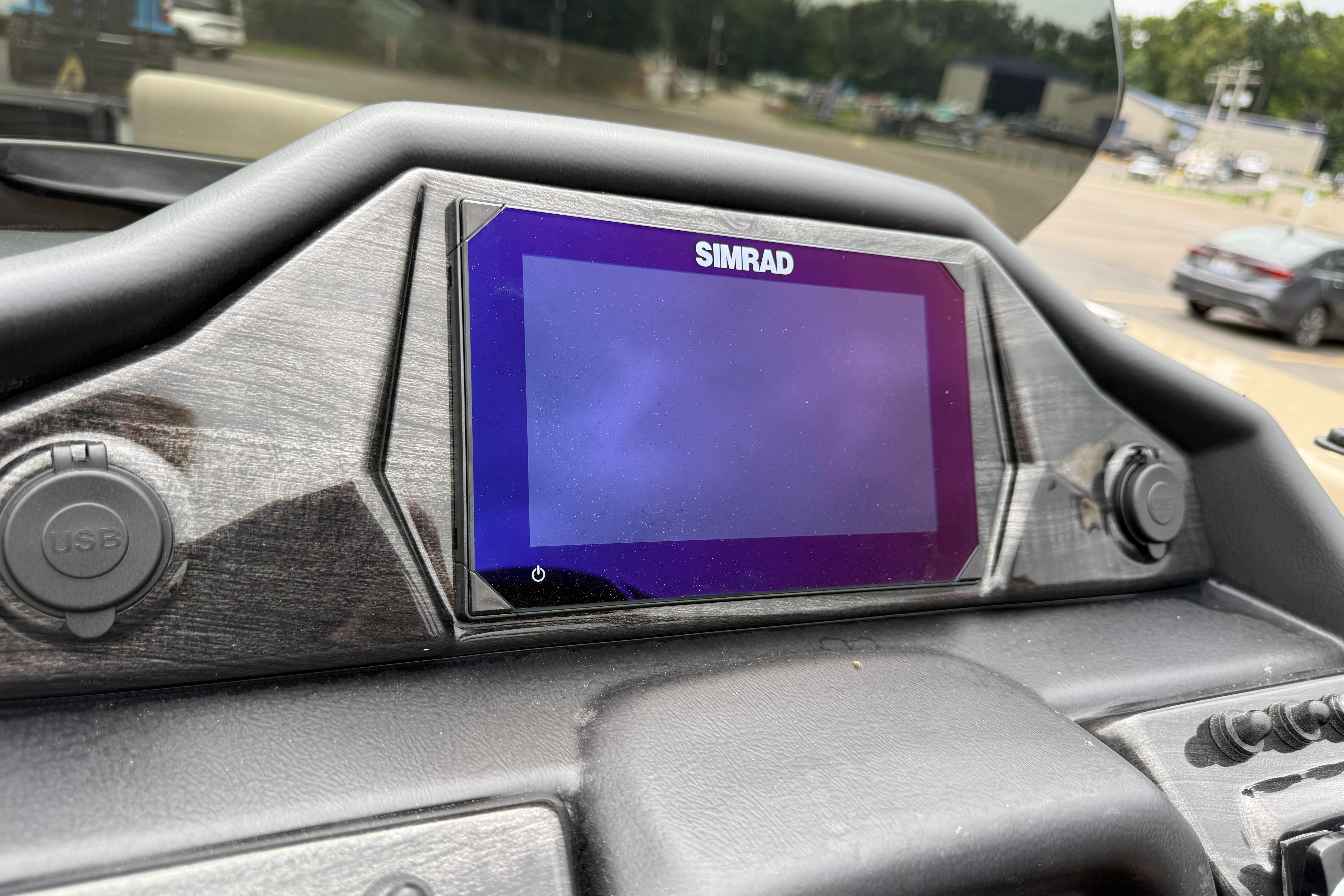 Dashboard of 2026 Bentley Pontoons Elite 253 Admiral with Simrad display.