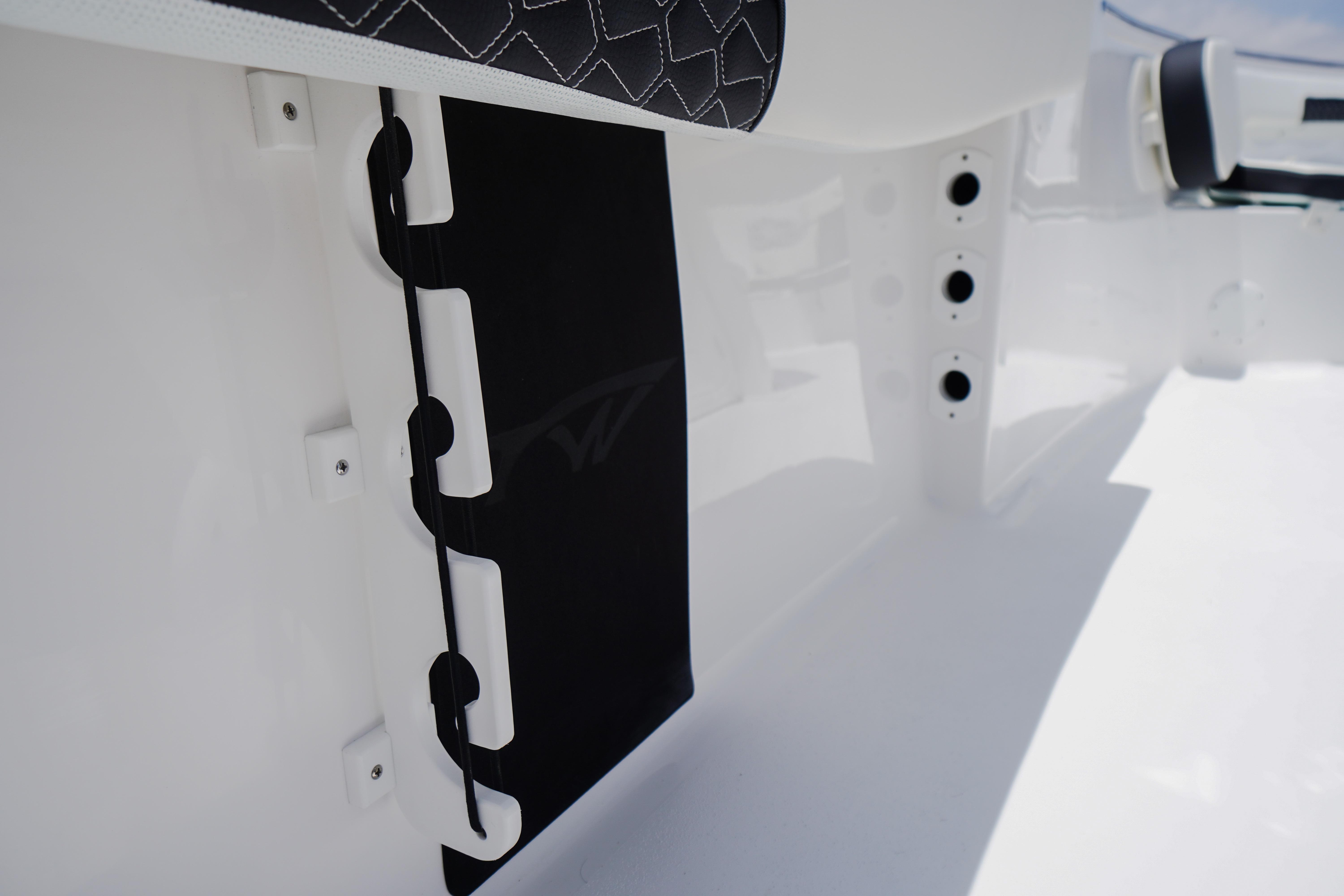 2027 Tidewater 220 CC Adventure boat interior detail with sleek black and white design.
