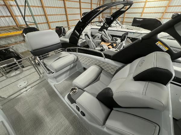 2025 Manitou LX boat interior with luxurious seating and modern design.