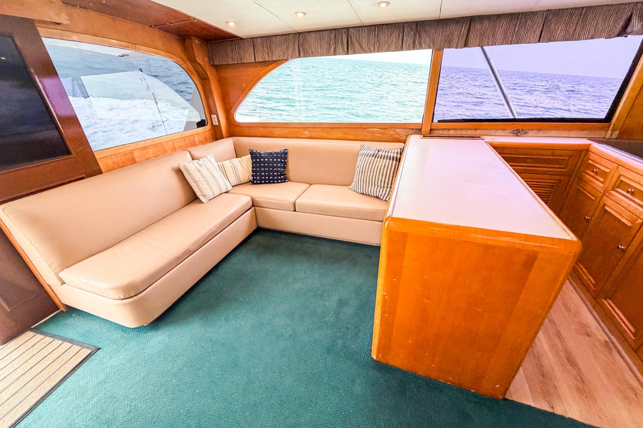 Luxurious interior of 1998 Blackwell Custom Carolina Sportfish yacht with ocean view.