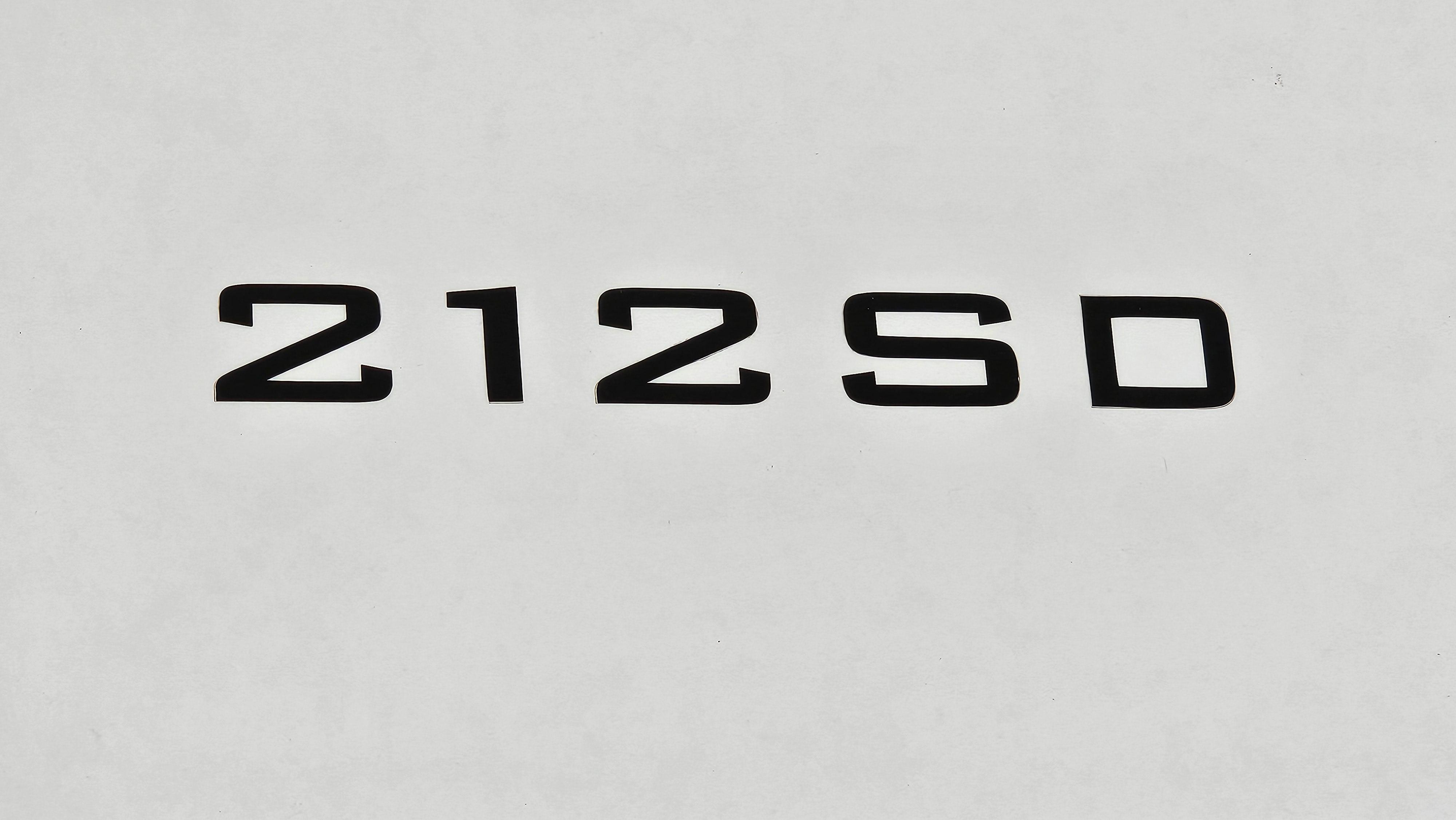 Yamaha Boats 212SD model emblem, 2021, black lettering on white background.