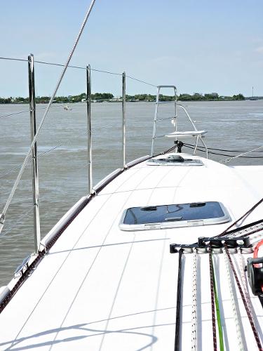 2025 Seawind 1160 XL yacht deck with ocean view and clear sky.