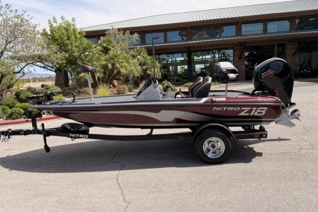 2026 Nitro Z18 boat parked outdoors, showcasing sleek design and modern features.