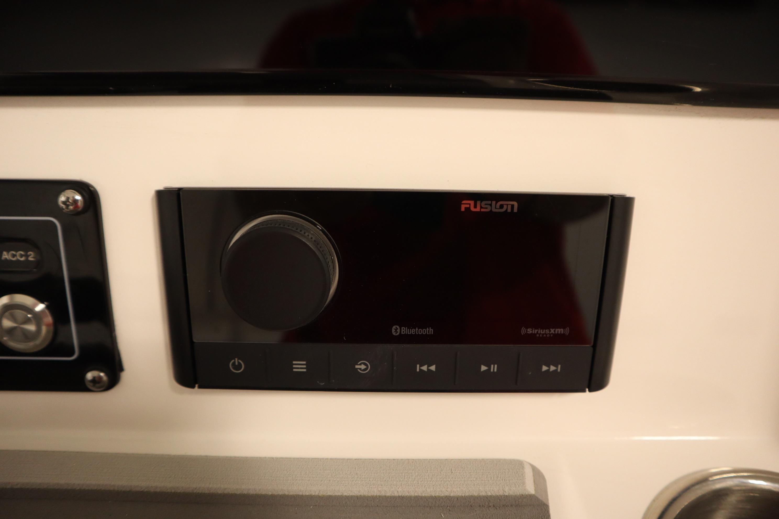 Fusion audio system on 2026 Sea Fox 228 Commander boat dashboard.