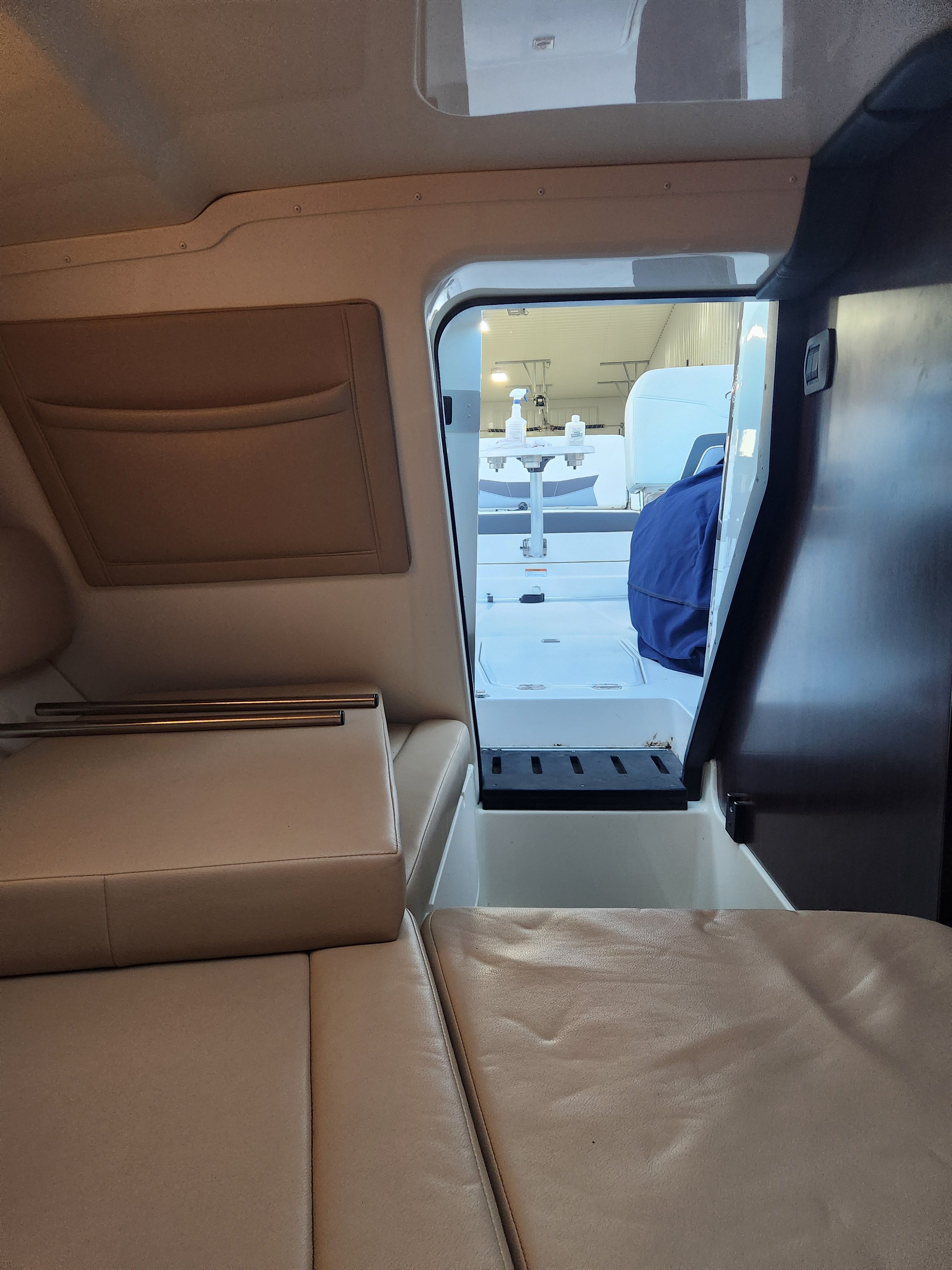 Interior of a 2015 Monterey 268SSC boat with seating area.