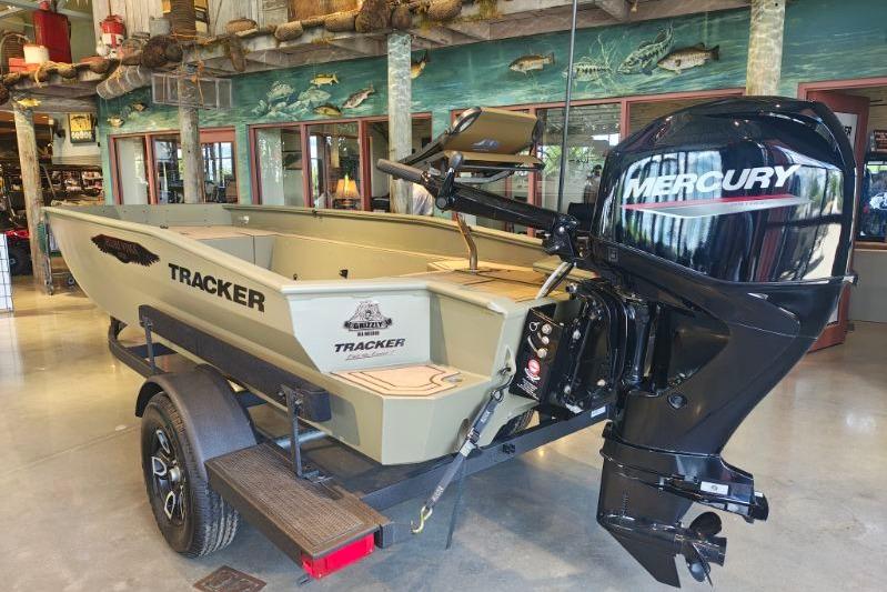 2026 Tracker Grizzly 1650 T Prairie Wings Edition boat with Mercury outboard motor.
