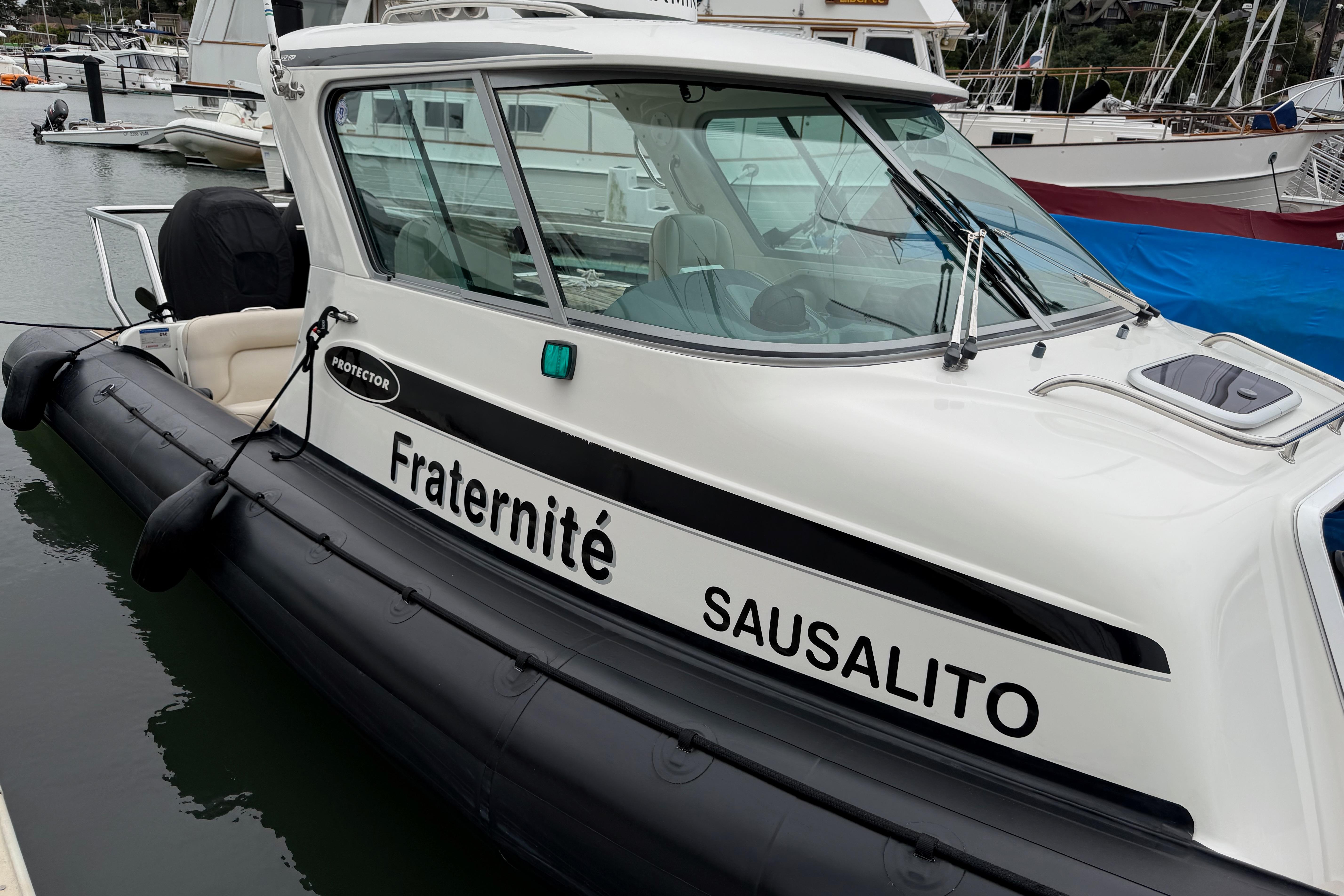 2016 Protector Targa 30 boat named "Fraternité" docked in Sausalito marina.