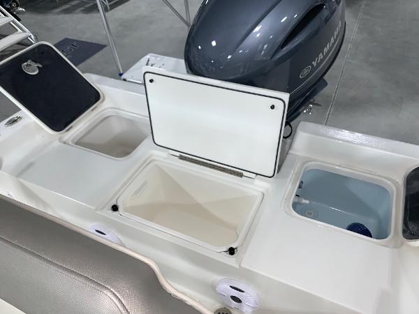 2024 Key West 188 Bay Reef boat with open storage compartments and Yamaha engine.