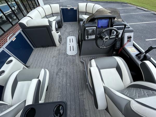 Interior of a 2020 Veranda VP22VLC pontoon boat with luxurious seating.
