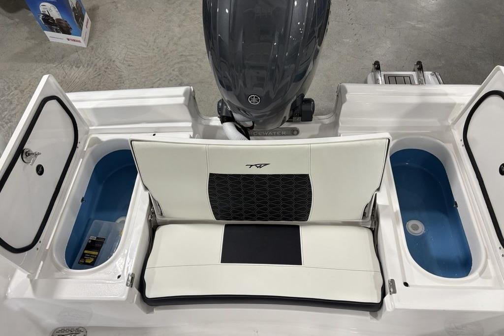 2026 Tidewater 2210 Carolina Bay boat interior with seating and storage compartments.