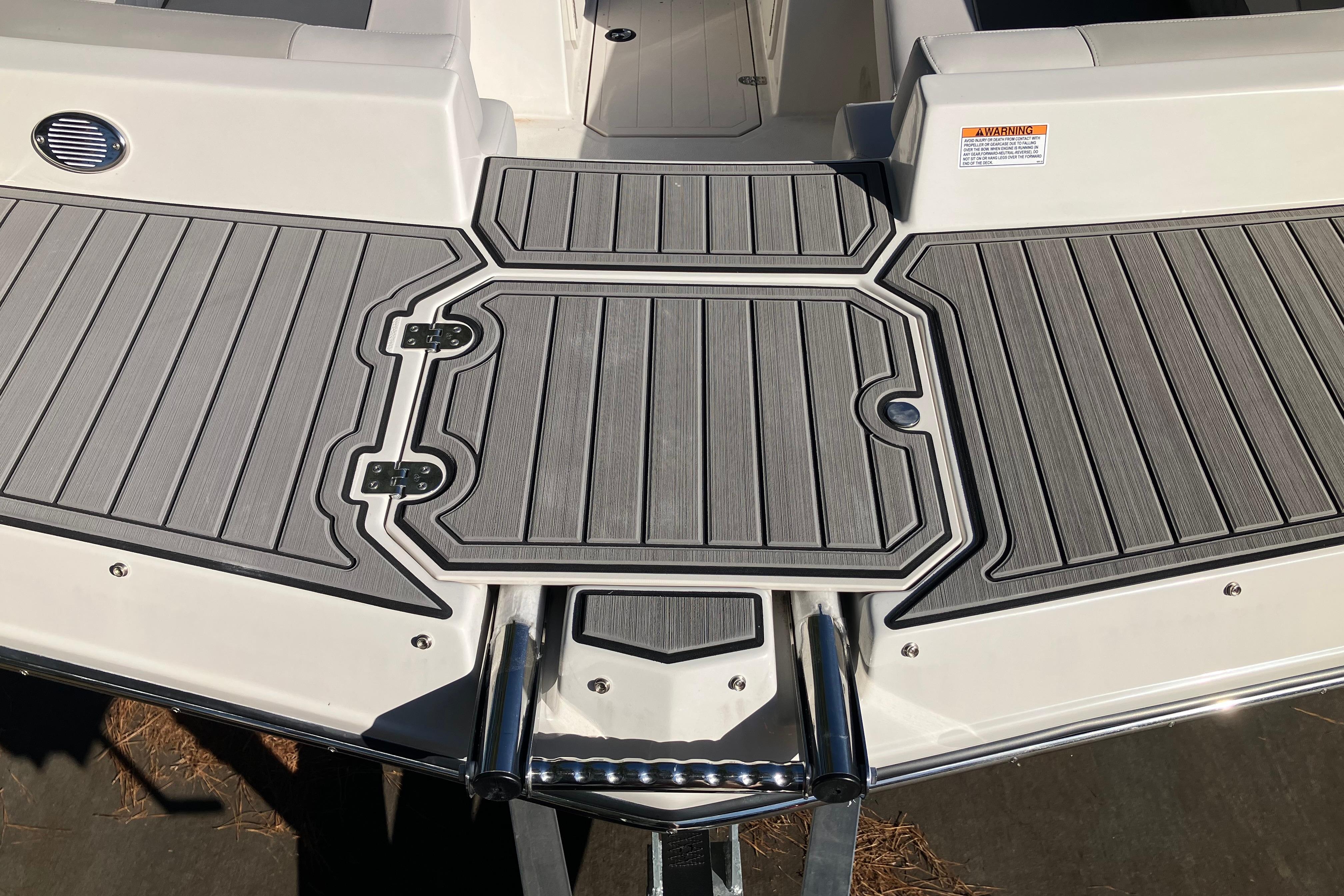 2025 Starcraft SVX 210 OB boat deck with sleek gray non-slip surface.