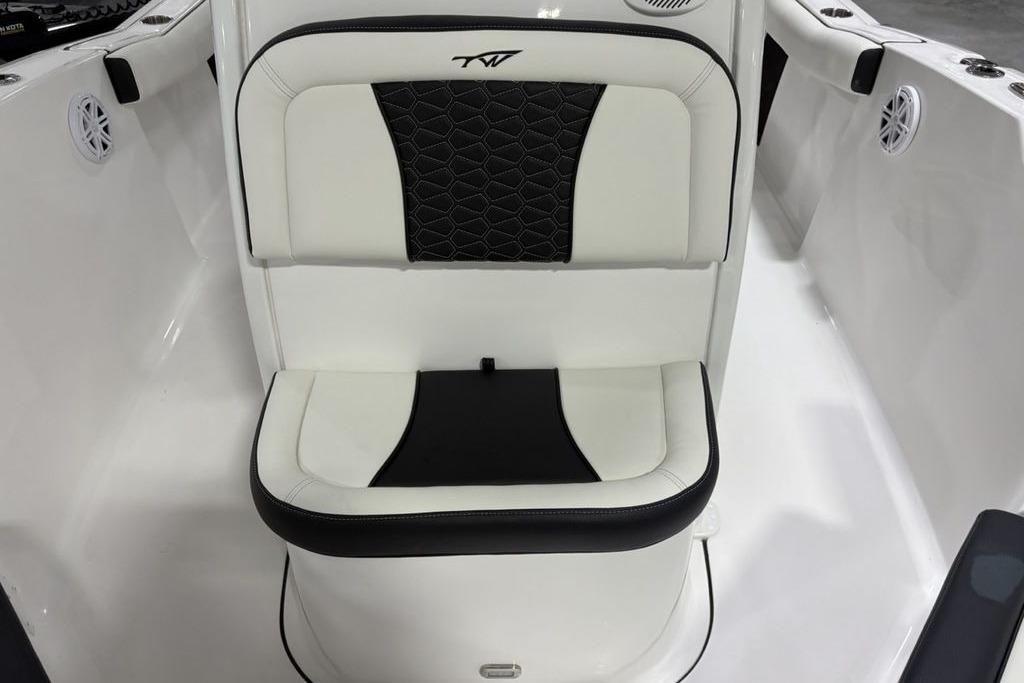 2026 Tidewater 232 CC Adventure boat seat with black and white upholstery design.