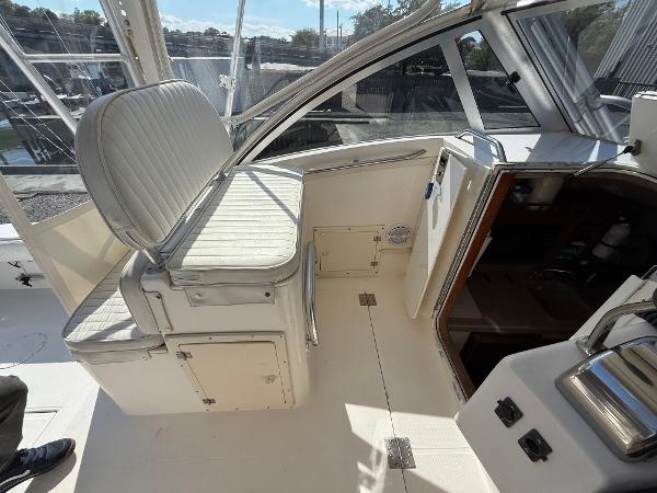 2001 Albemarle 280 Express Sport Fisherman interior with seating and cabin entrance.