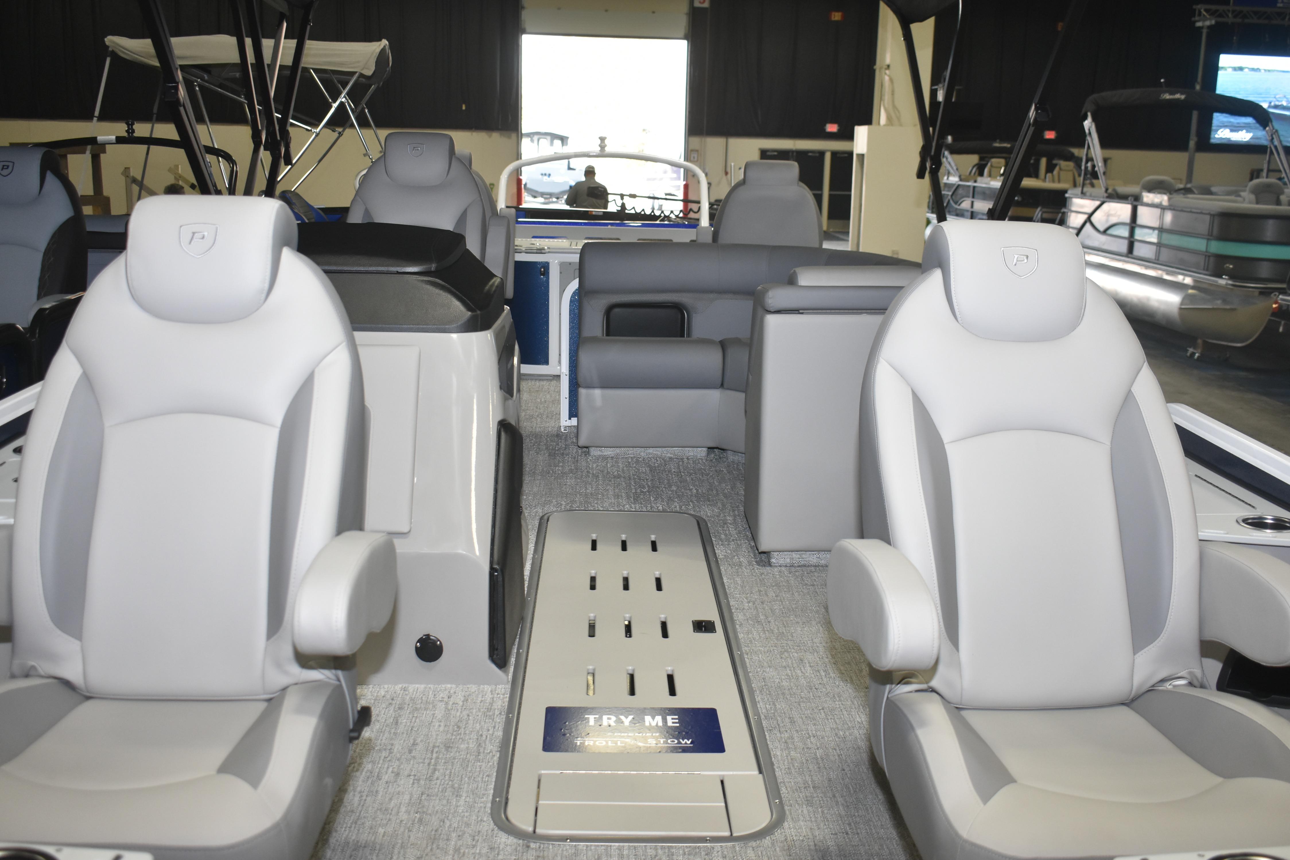 Interior of 2026 Premier 230 Sunsation Angler 4PT boat with luxurious seating.