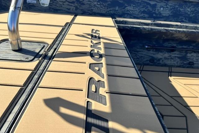 2026 Tracker Grizzly 1756 T Marsh boat deck with logo and metal handle.