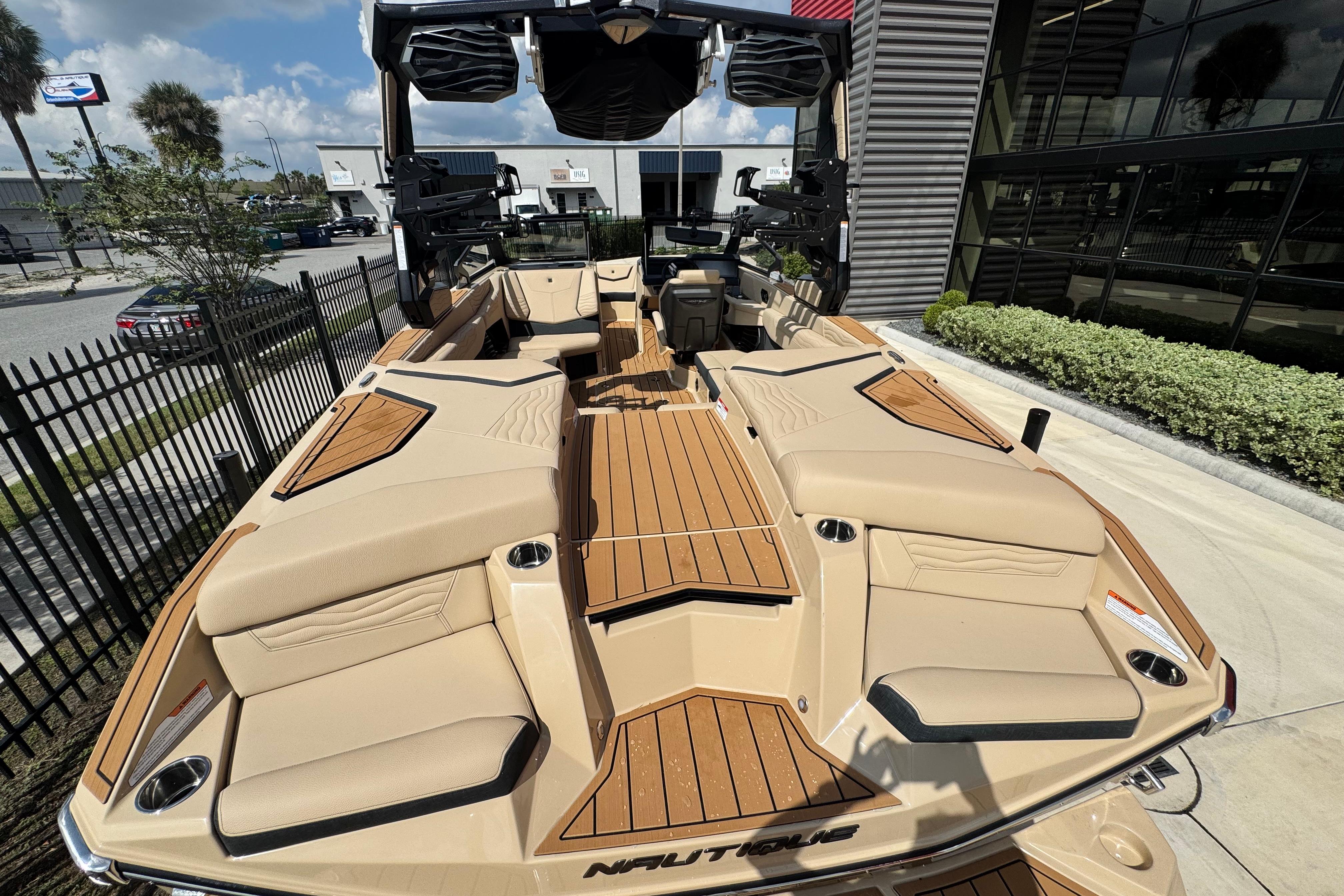 2026 Nautique Super Air Nautique G23 Paragon boat with luxurious seating and sleek design.