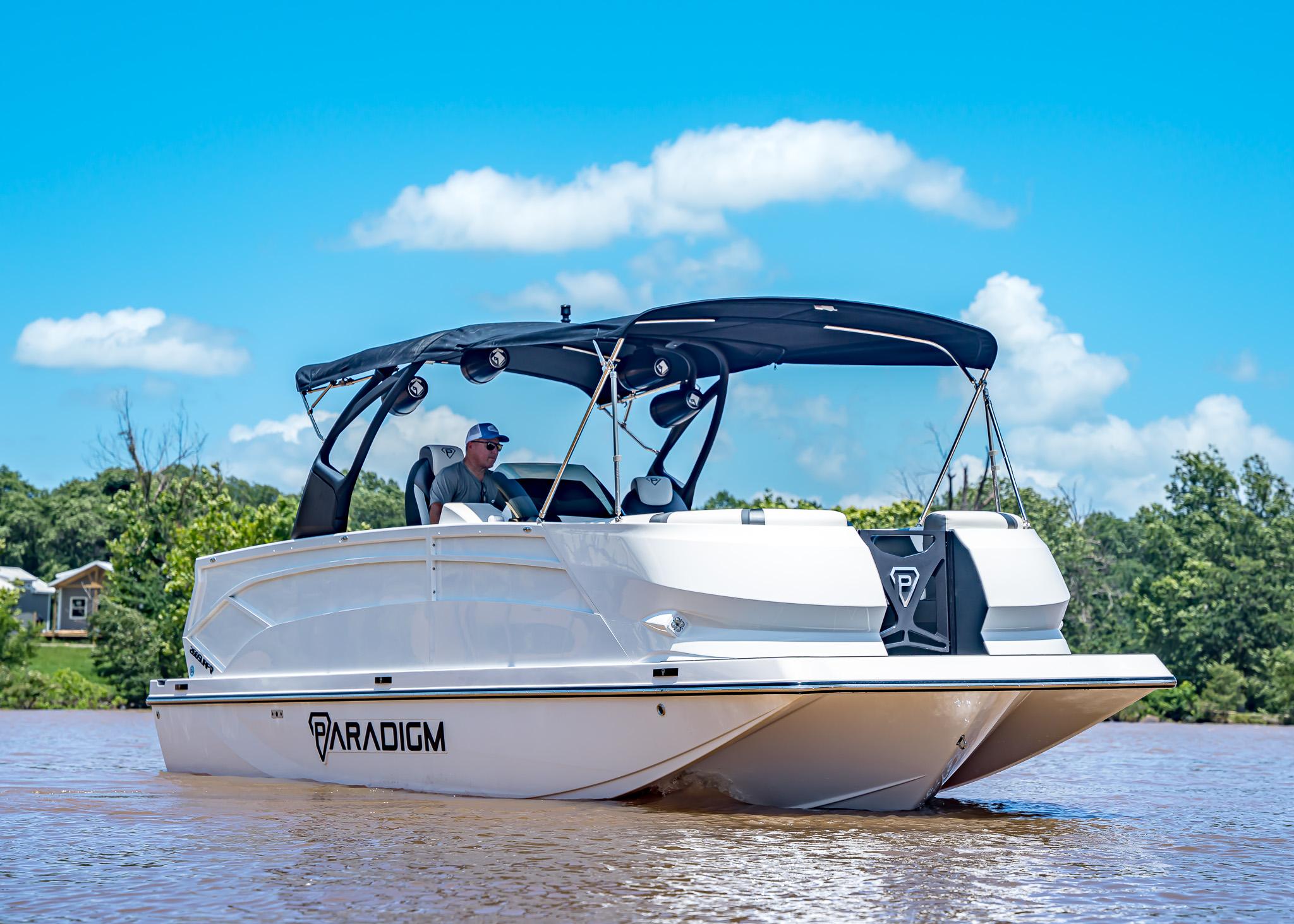 2025 Paradigm Damascus 266 Surf boat cruising on a sunny day.
