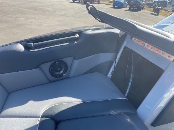 2025 Moomba Mondo boat interior with speaker and seating detail.