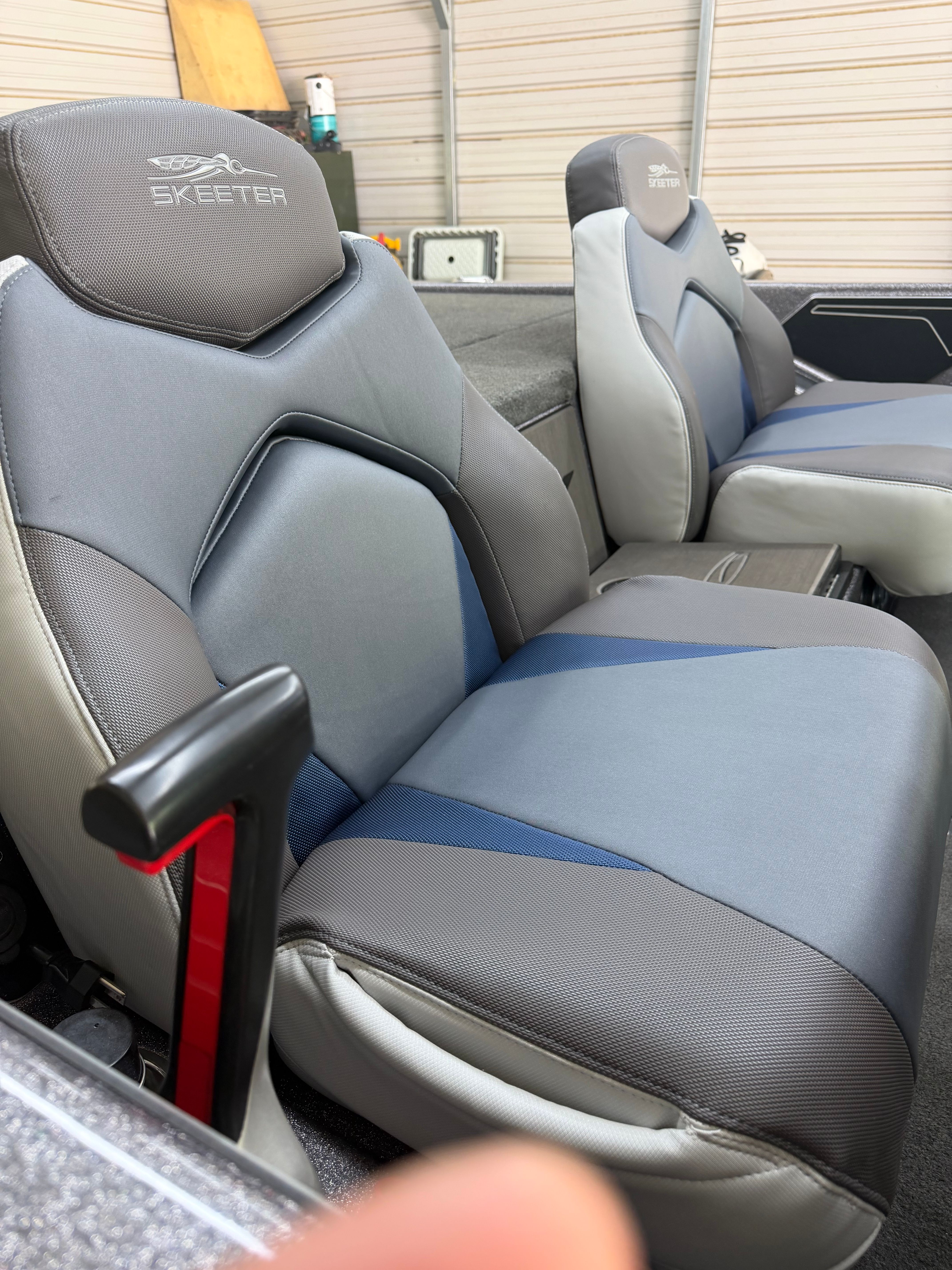 The seats of a 2017 Skeeter ZX250 boat in a modern design.