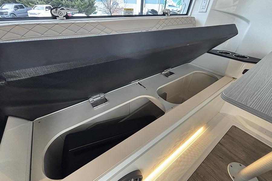 2026 Navan C30 interior storage compartment with open lid, showcasing ample space and modern design.