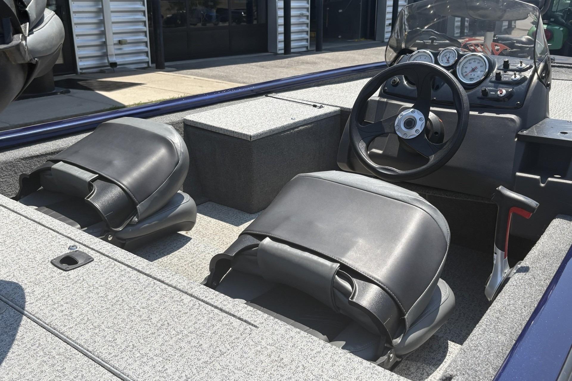 2020 Tracker Pro 170 boat interior with steering wheel and seating.
