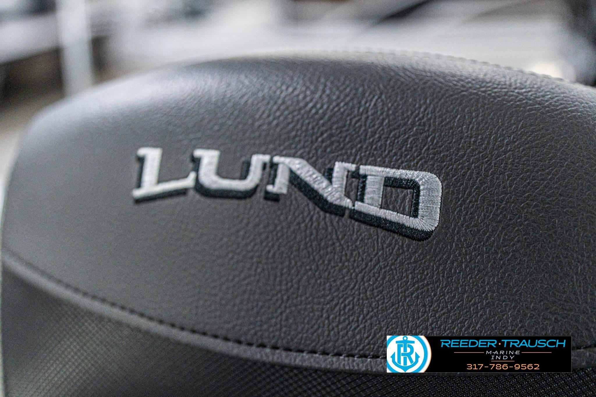 Close-up of 2026 Lund 1700 Explorer Sport boat seat with logo.