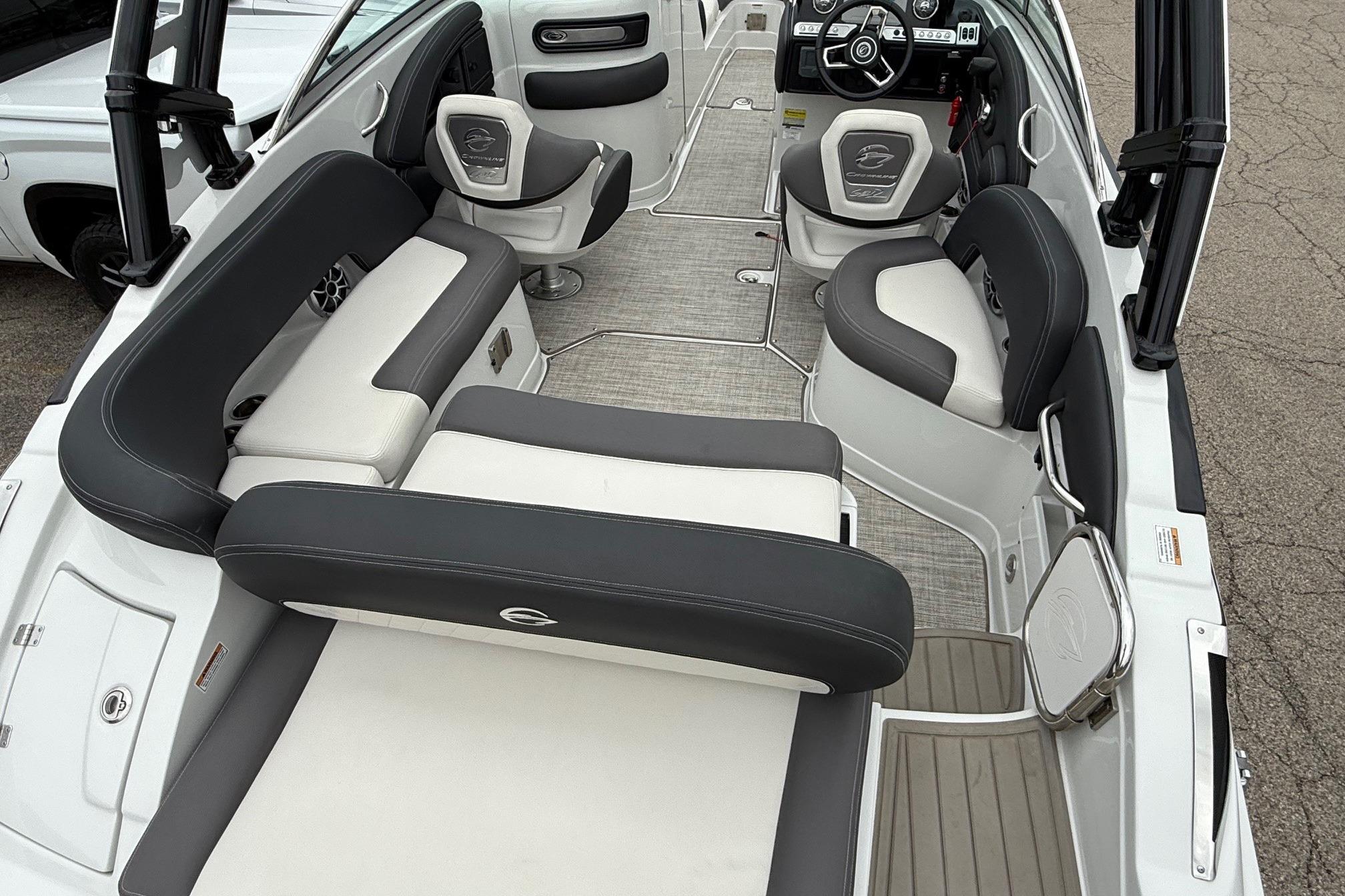 2022 Crownline 255 SS boat interior with sleek seating and modern dashboard design.