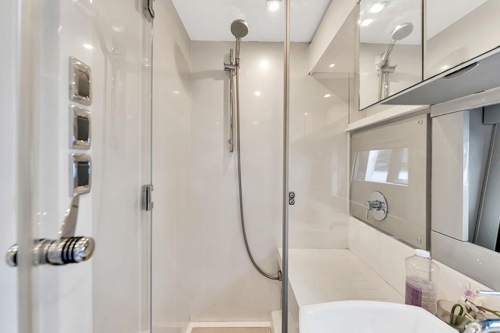 Luxurious bathroom interior of 2012 Fairline Targa 58 yacht with modern shower design.