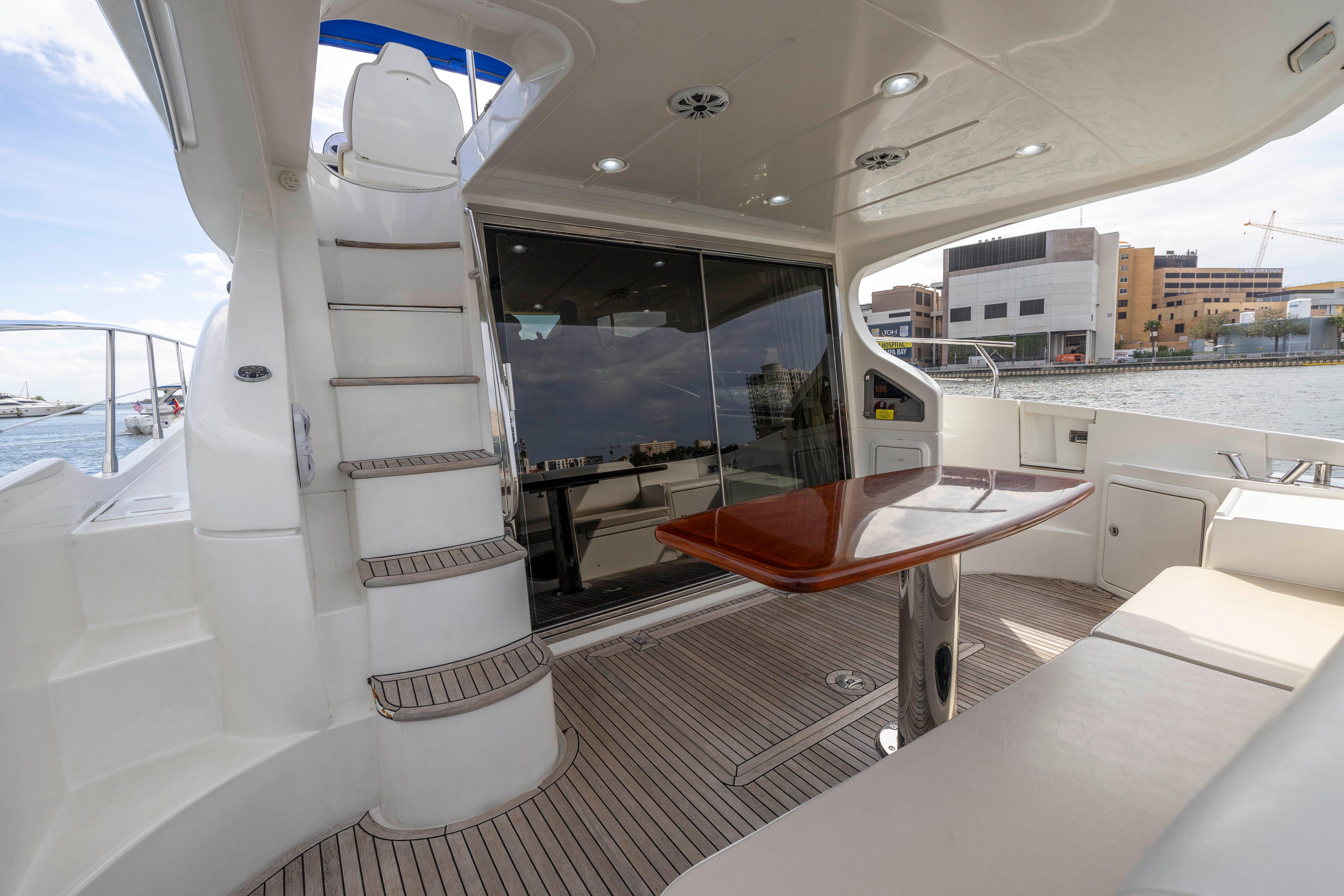 2012 Azimut 48 Flybridge yacht with spacious deck and modern amenities.