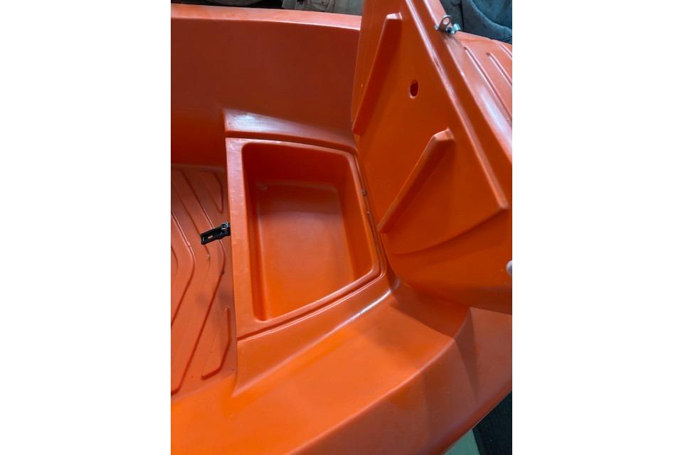 Orange River Boats 350, 2022 model, featuring an open storage compartment.
