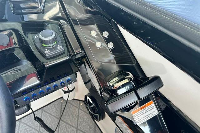 Control panel of 2021 Yamaha Boats 275SD, featuring sleek design and modern controls.