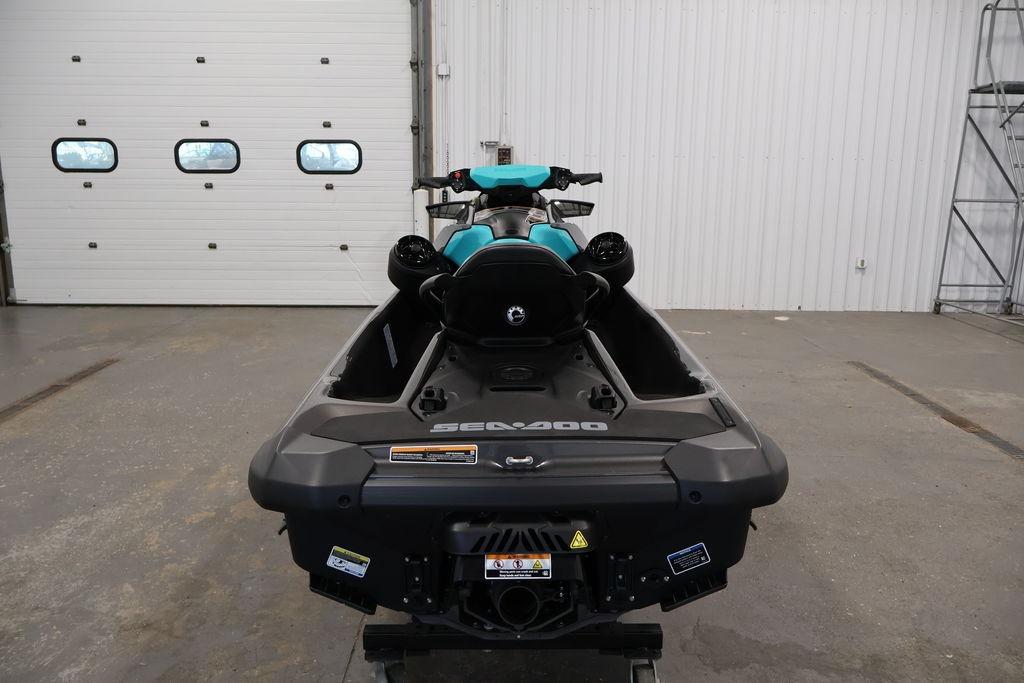 2026 Sea-Doo GTR 230 jet ski in a garage, rear view.
