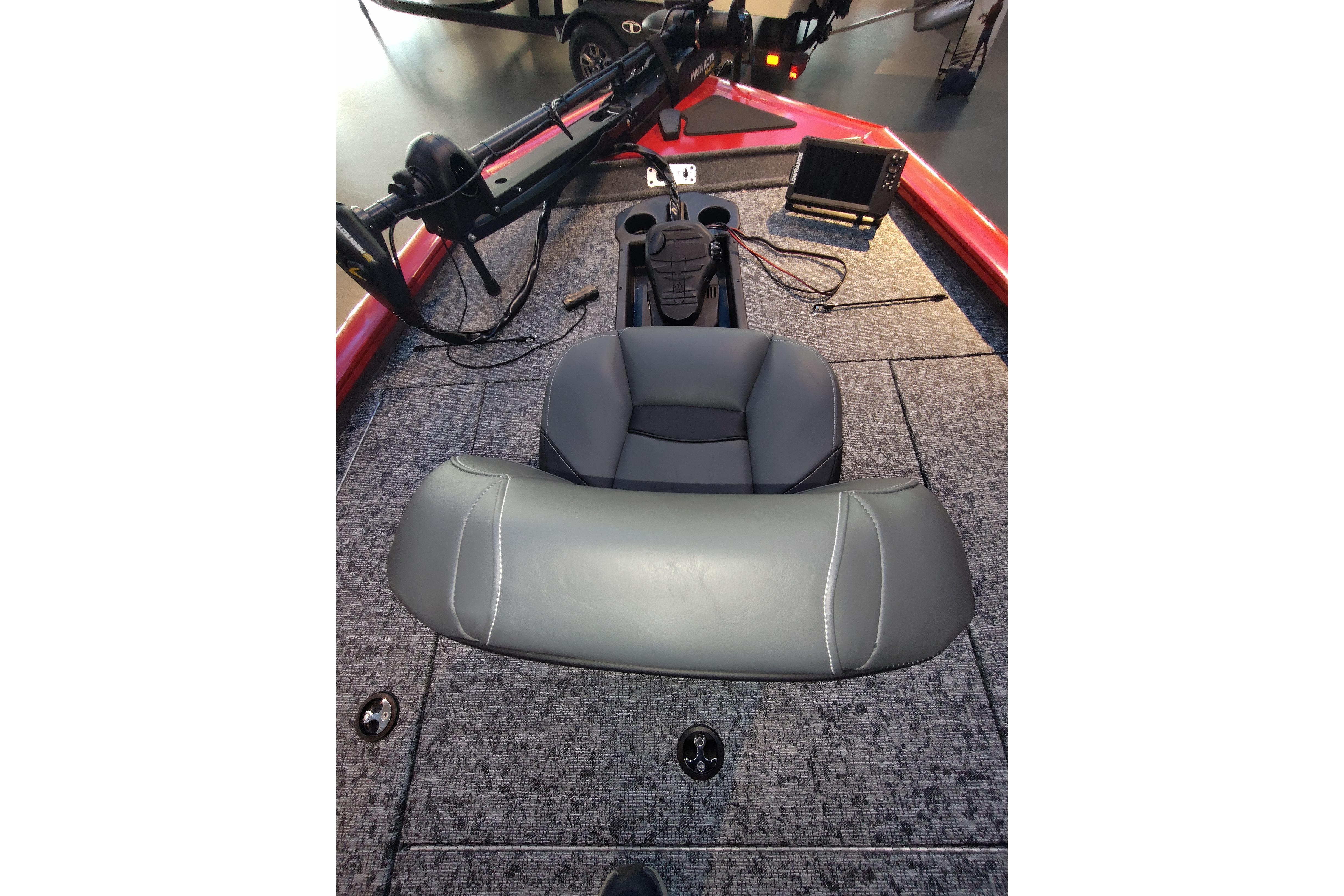 2026 Tracker Pro Team 195 boat interior with seating and control panel.