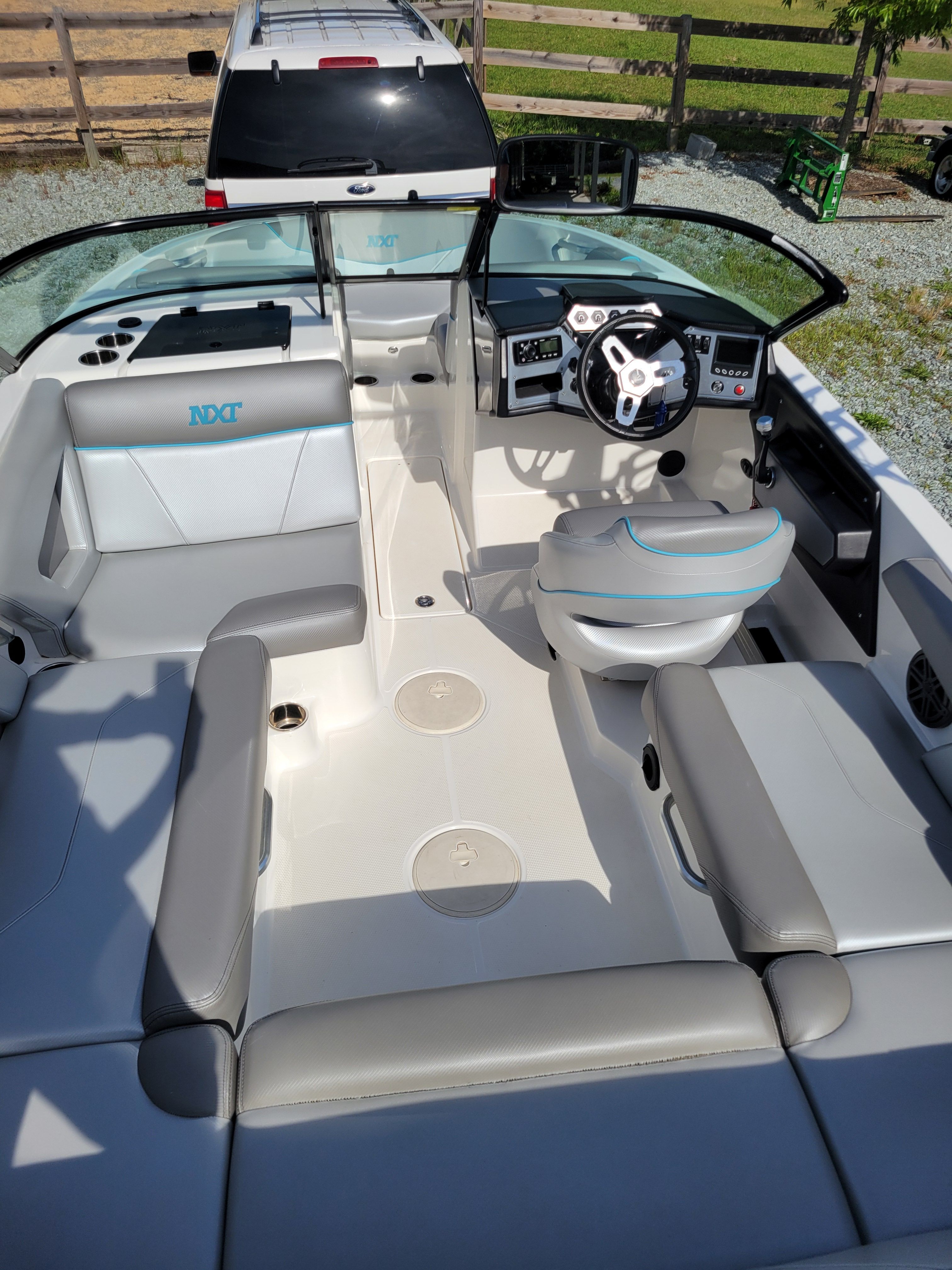 Interior of a 2017 MasterCraft NXT20 boat with gray seating.